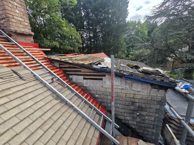 Re-roof in progress across multiple slopes — PGA Installations roofing project